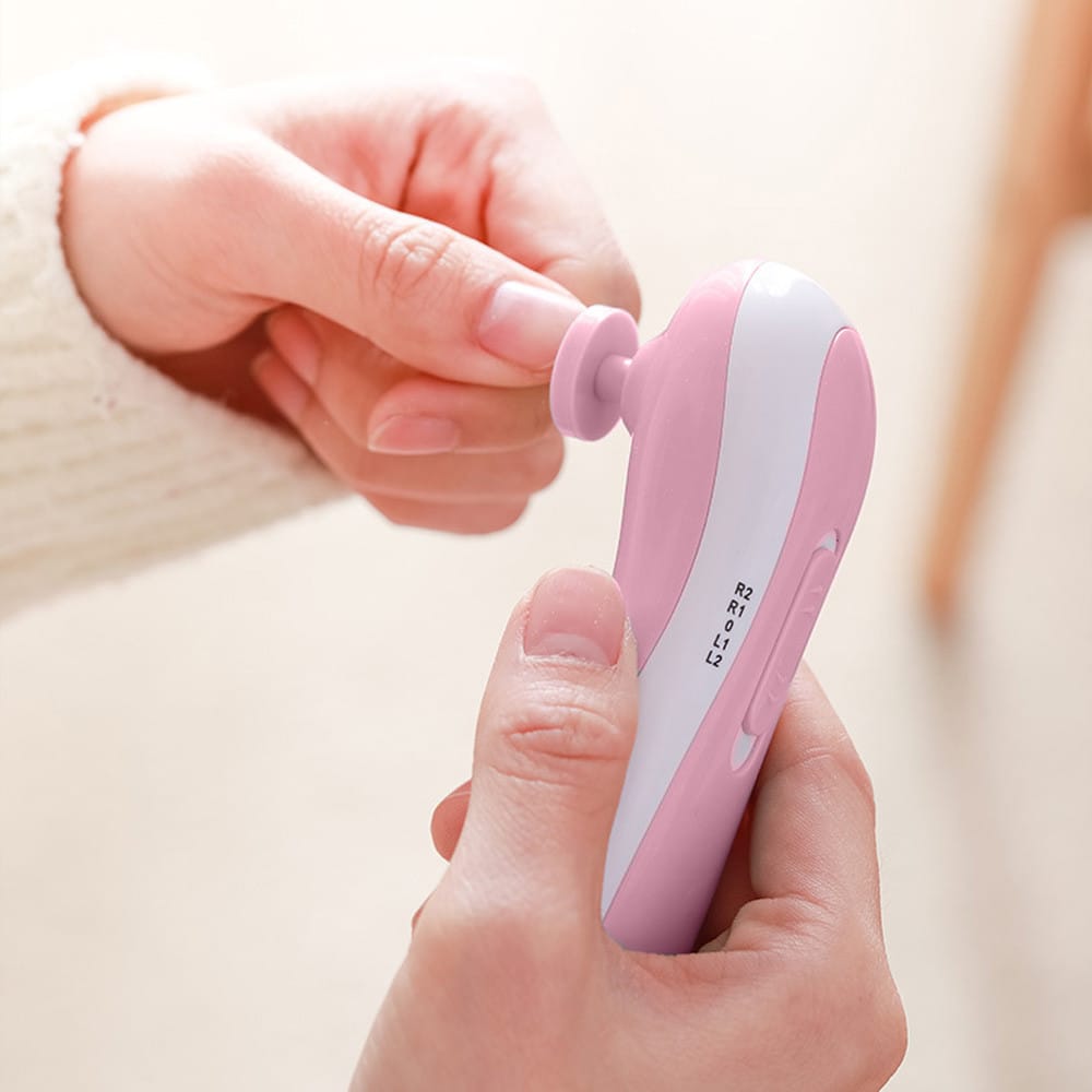 Електрична пилка для нігтів NAIL TRIMMER XL-667 рожева із 6 насадками та кейсом